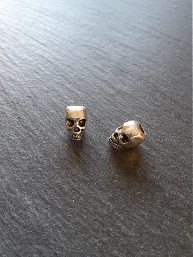Skull beads antique - or,