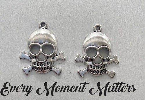 Tibetan silver skull - x,