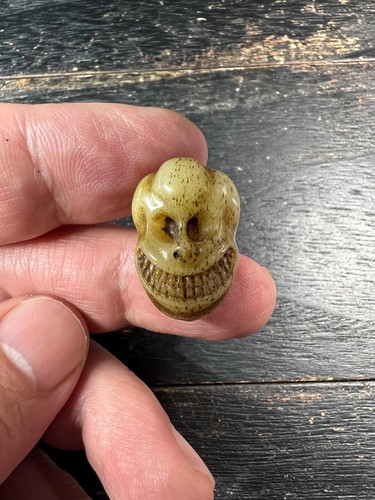 Hand carved yak bone - yak,