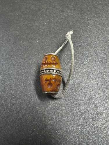 Hand carved yak - hand, charnel